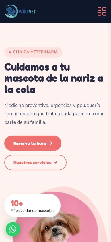 Sitio de clínica veterinaria con la plantilla Amigable y Colorida visto en un teléfono
